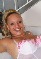 ATK Exotics: Roni (Hairy babe Roni teases with her large tits and fluffy pussy)