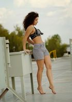 Sativa is outside at the dock, stripping by the waterfront., Sativa Verte (sat007) ATK Natural & Hairy: Sativa Verte (Sativa is outside at the dock, stripping by the waterfront.)